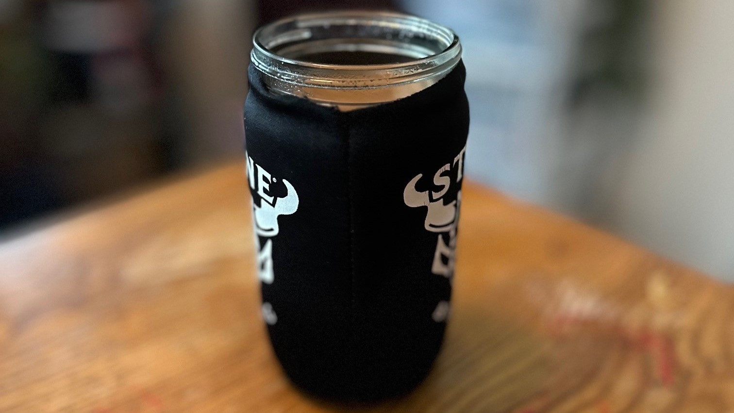 Coconut oil jar with coffee in it.